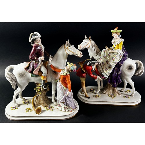 70 - Pair of Capodimonte equestrian groups of characters in 18th century dress with floral sprig detail