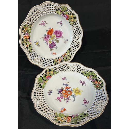 90 - A pair of Herend plates with pierced borders and floral spray detail in the Meissen style, A Copenha... 