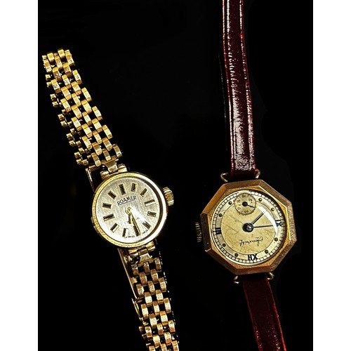 426 - A lady’s 9ct yellow gold cased wristwatch and another 9ct yellow gold cased example by Accurist.