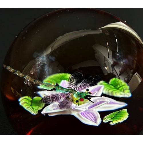 157 - Three Caithness paperweights of a dragon fly over Water Lilly , ladybird on a lilac sprig , and a re... 