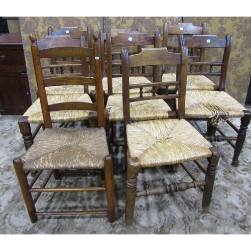 1078 - A set of seven matching early 20th century rush seat refectory dining chairs and a single similar, (... 