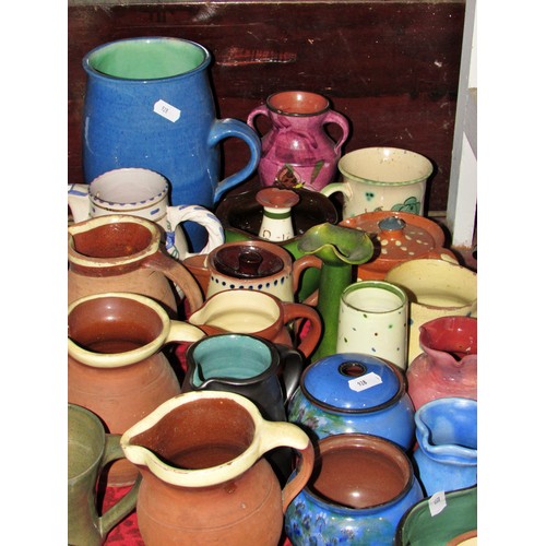 121 - A mixed group of British studio pottery, jugs etc to include Torquay and other examples