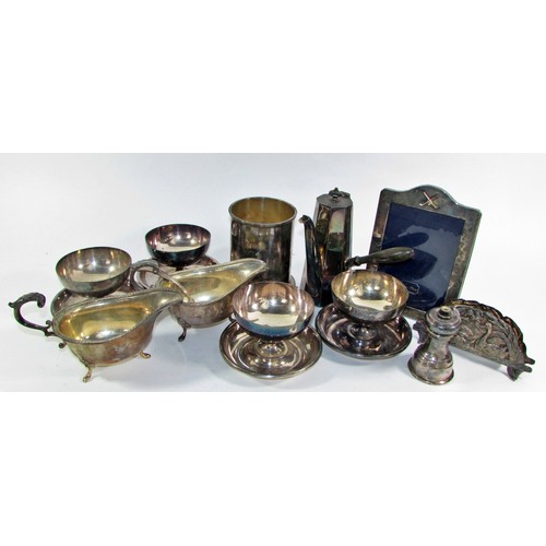 264B - A miscellaneous collection of silver plated table ware, including two trays, a cooling rack, a wine ... 