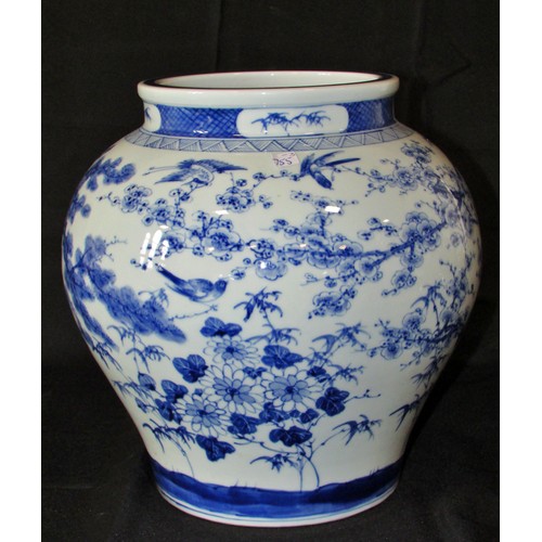 124 - A Chinese blue & white vase of bulbous form (30cm tall x 28cm wide) with apocryphal reign marks to u... 