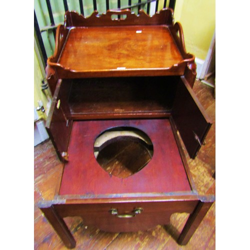 1372 - A Georgian mahogany tray top commode, enclosed by two doors on moulded supports, 56cm wide x 48cm de... 