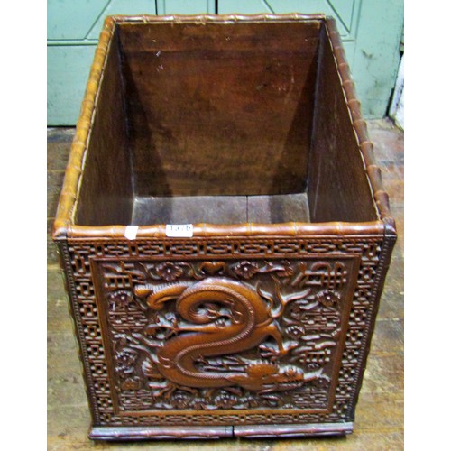 1376 - A Chinese carved rectangular hardwood box, with dragon, cloud and other detail, within a geometric b... 