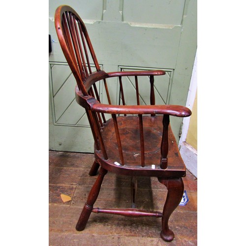 1478 - An 18th century Windsor elbow chair principally in part yew and fruit wood, on shaped forelegs and t... 