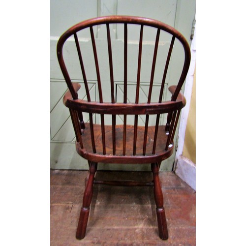 1478 - An 18th century Windsor elbow chair principally in part yew and fruit wood, on shaped forelegs and t... 