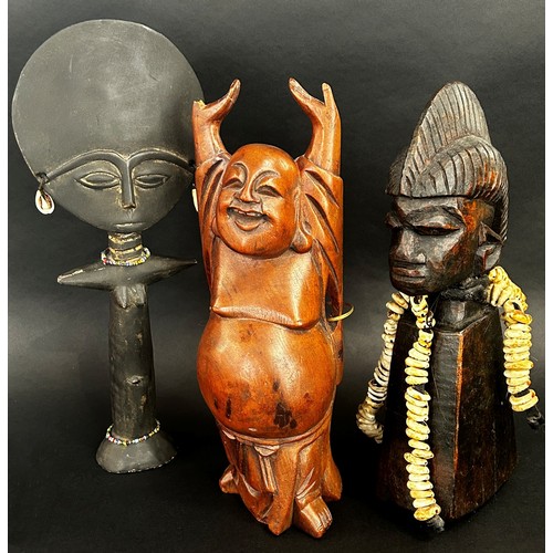 1738 - Three various carved African and other figures to include and Ashanti fertility doll, and African tr... 