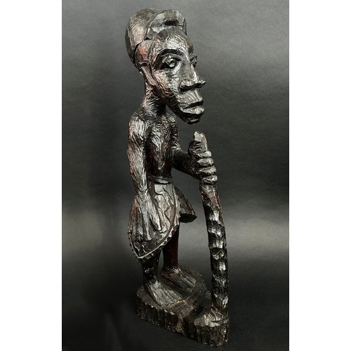 1740 - A group of African / likely Nigerian / Yoruba hardwood carvings to include a small bowl with figural... 