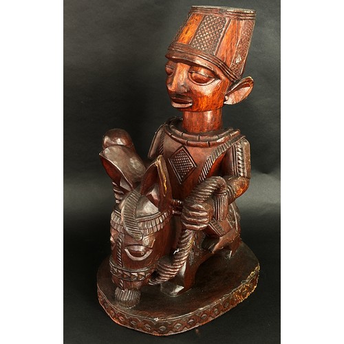 1742 - Attributed to the Fakeye group, a large Yoruba / Nigerian carved hardwood figure group, in the form ... 