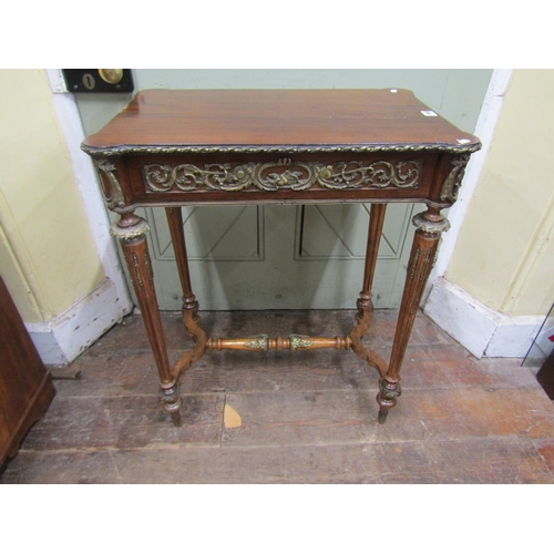 1368 - A decorative mahogany centre table raised on four turned and fluted supports with central stretcher,... 