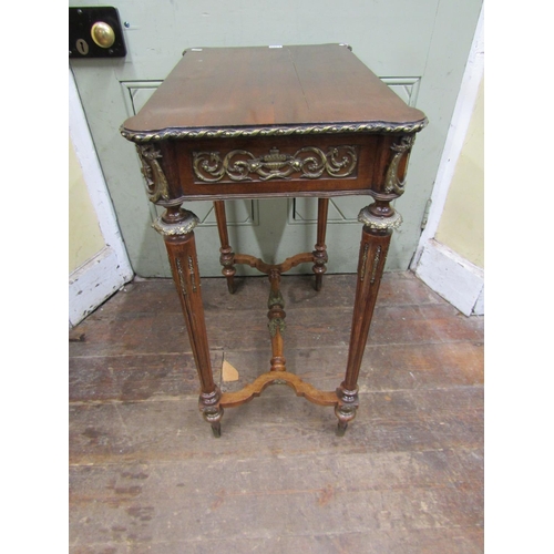 1368 - A decorative mahogany centre table raised on four turned and fluted supports with central stretcher,... 