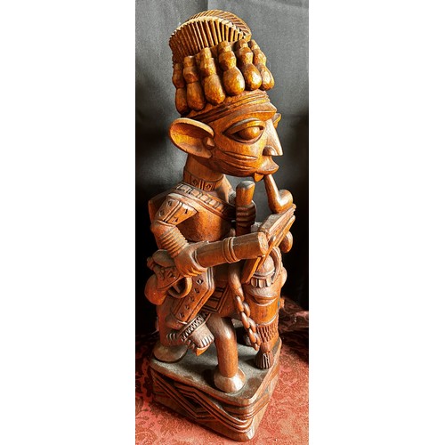 1731 - Akinlabi (Akin) Fakeye (Nigerian, Yoruba b.1936) A good associated pair of figure carvings, one an O... 