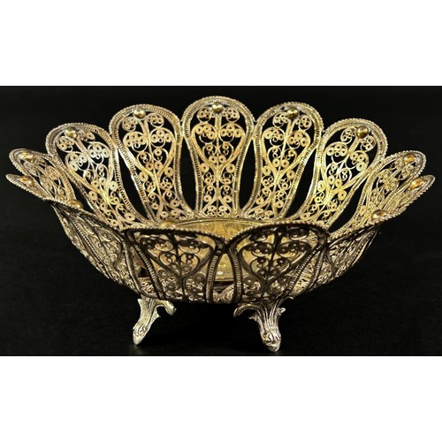 217 - An Indian silver fine wire work filigree lotus bowl, stamped 925 to the base, 17 cm diameter, 5.7 oz... 