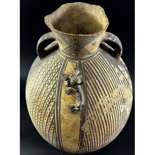 1744 - A large (possibly) pre-Colombian terracotta effigy vessel, of ovoid form with twin handles, with str... 