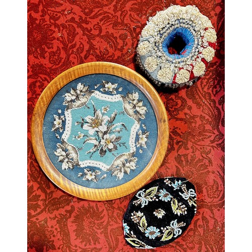 483A - A varied miscellaneous collection to include a circular framed beadwork panel, a large beadwork circ... 