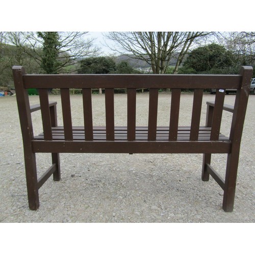 36 - A Wrinch vintage stained teakwood two seat garden bench with slatted seat and back, 127 cm wide