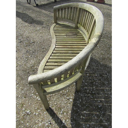 39 - A weathered teak banana bench (AF), 160 cm wide