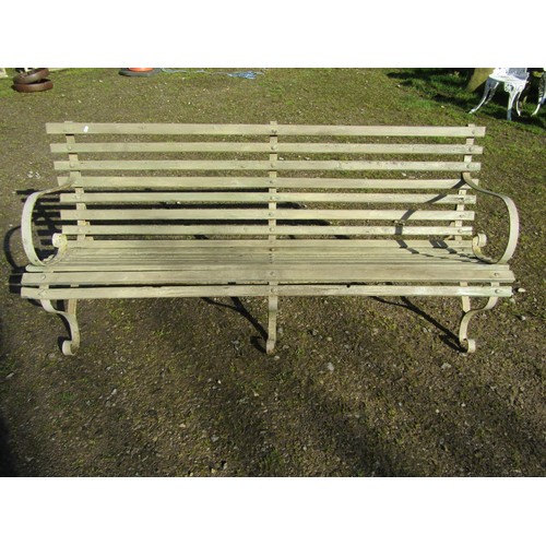 76 - A vintage painted sprung steel garden bench with slatted seat, 184cm long