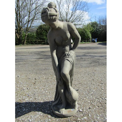 A cast composition stone garden ornament in the form a  classical maiden 105 cm high