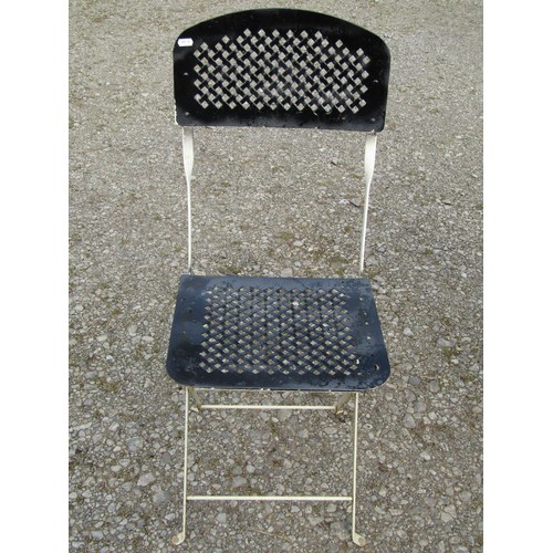 82 - A painted folding steel three piece Bistro set with lattice detail, the table 77cm diameter (af)