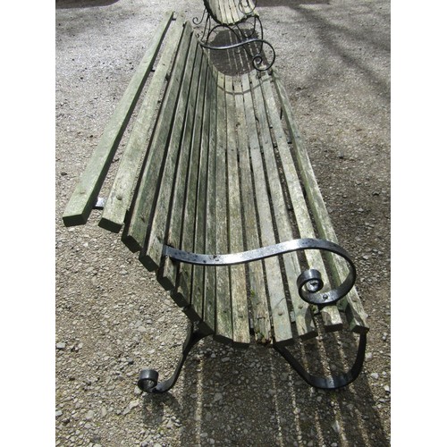 61 - A vintage heavy gauge park/estate  garden bench with weathered green painted teak slatted seat raise... 