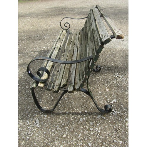 62 - A heavy gauge park/garden bench  with weathered teak slatted seat raised on heavy gauge sprung steel... 