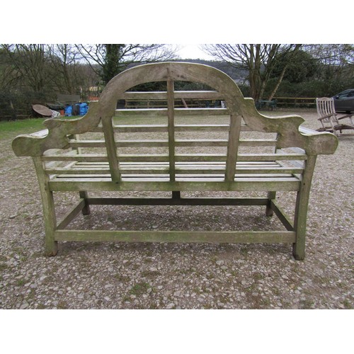 86 - A weathered teakwood Lutyens style three seat garden bench, 167cm wide