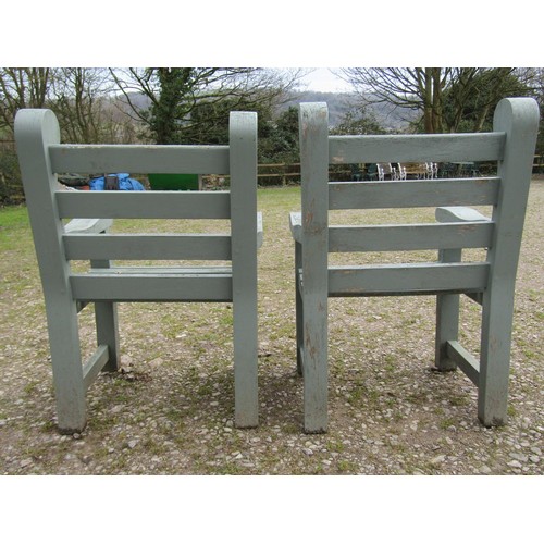 89 - A pair of Woodfern heavy gauge painted and weathered teak garden open armchairs with slatted seats a... 