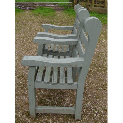 89 - A pair of Woodfern heavy gauge painted and weathered teak garden open armchairs with slatted seats a... 