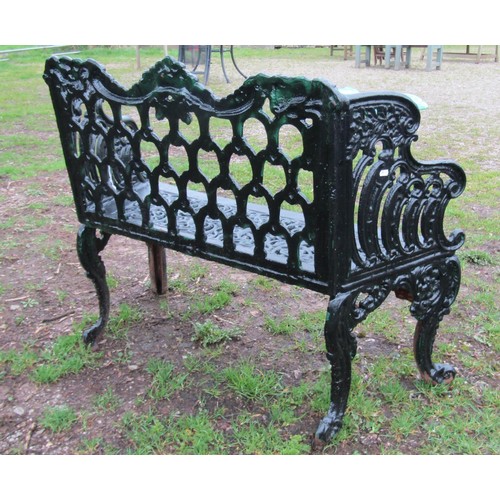 90 - A good quality heavy gauge cast iron two seat garden bench with shaped outline and decorative pierce... 