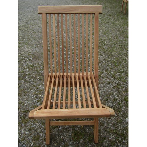 70 - An associated suite of garden furniture comprising a weathered teak table with rectangular slatted p... 