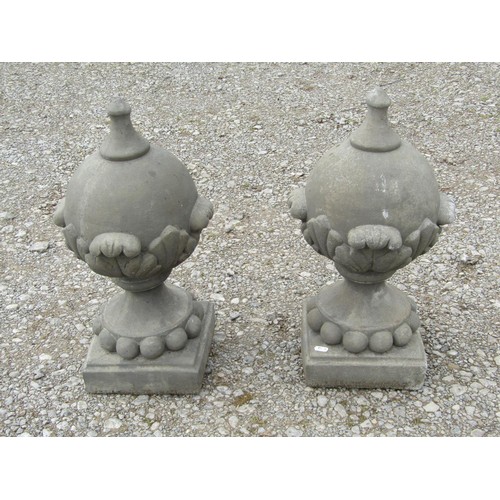 71 - A pair of cast composition stone pointed sphere pier cap finials with acanthus detail 53 cm high