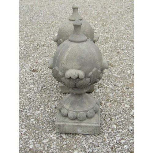 71 - A pair of cast composition stone pointed sphere pier cap finials with acanthus detail 53 cm high