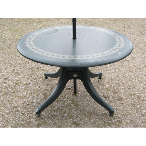 75 - A moulded plastic patio set by Hartman consisting of a circular top table, 120 cm diameter raised on... 