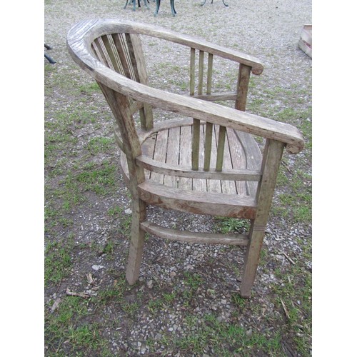 99 - A good quality large weathered (silvered teak) circular garden table with slatted panelled top and r... 