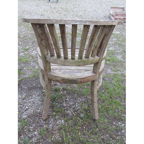 99 - A good quality large weathered (silvered teak) circular garden table with slatted panelled top and r... 