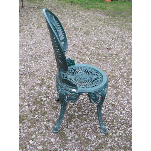 100 - A green painted cast aluminium garden terrace table of circular form, with decorative pierced top, t... 