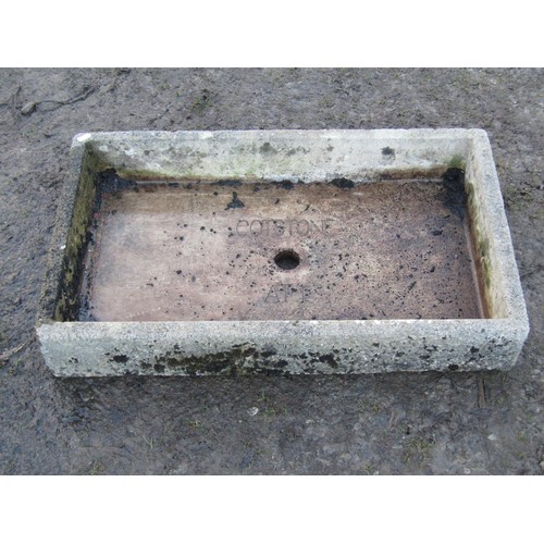 19 - Three stone  weathered cast composition garden troughs of varying size and design, the shallow recta... 