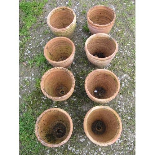 117 - Eight small weathered squat oviform terracotta planters with rope twist collars, 23 cm high x 24 cm ... 