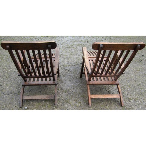 158 - Two similar good quality contemporary hardwood folding steamer type armchairs with slatted seats, ba... 