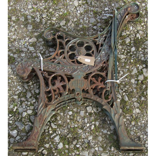 161 - Two pairs of matching cast iron bench ends with pierced foliate and lions mask detail, 72 cm (full h... 