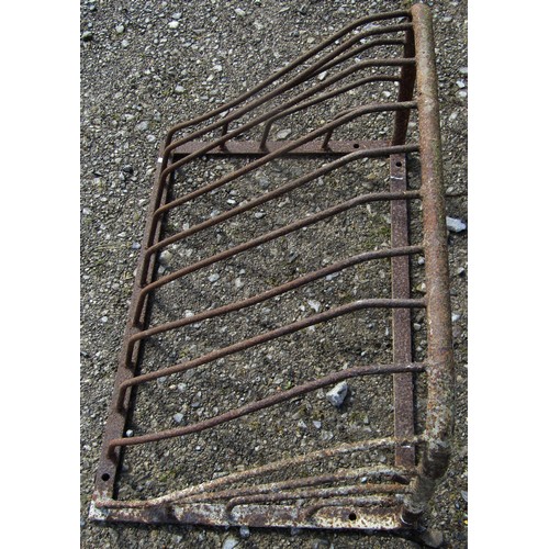 172 - Two vintage iron wall mounted  stable mangers of varying size, the largest 61 cm high x 92 cm wide t... 