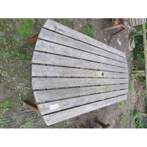 190 - A contemporary weathered soft wood garden terrace suite comprising table with rectangular slatted to... 