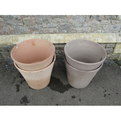 208 - Eight contemporary terracotta planters of circular form (two sizes) the largest 45cm high x 50cm dia... 