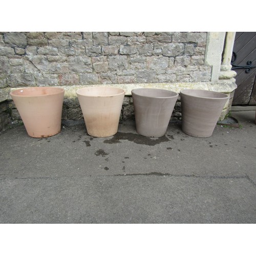 208 - Eight contemporary terracotta planters of circular form (two sizes) the largest 45cm high x 50cm dia... 