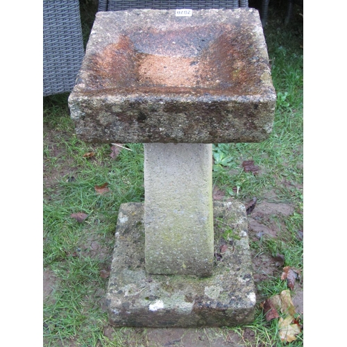 104 - Weathered cast composition stone bird bath, the top 32cm square x 64cm high