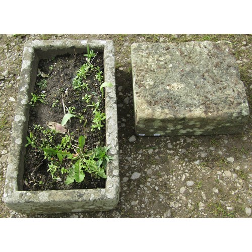 163 - A weathered rectangular natural stone trough, 17cm high, 73cm x 39cm together with an associated wea... 