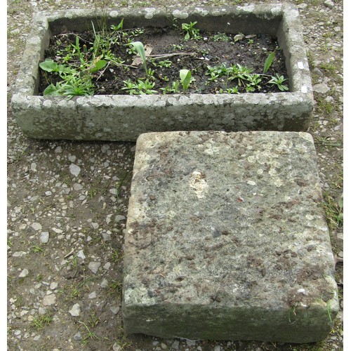 163 - A weathered rectangular natural stone trough, 17cm high, 73cm x 39cm together with an associated wea... 